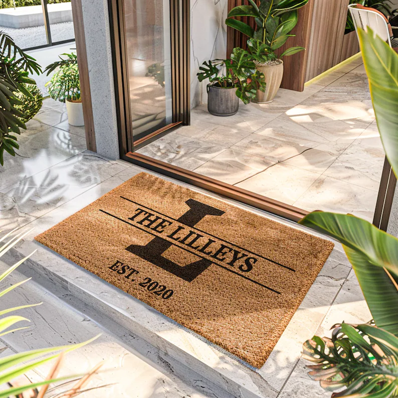 Custom logo entrance mat at a modern UK business entrance, displaying a vibrant company logo and offering floor protection and a professional welcome.