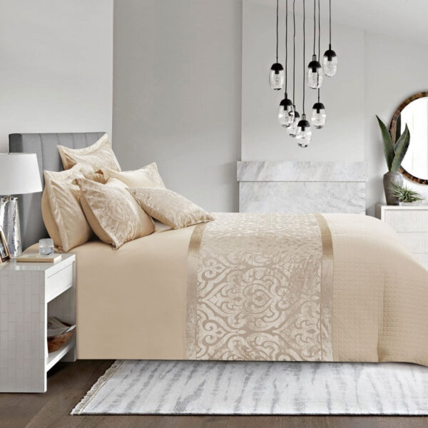 Beige jacquard duvet cover close-up showing damask pattern detail