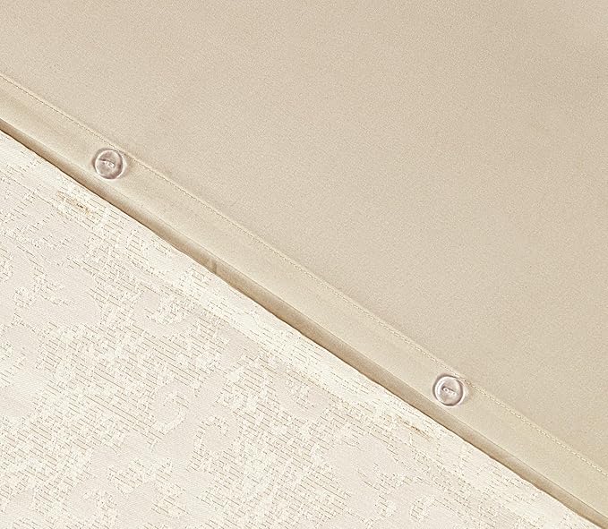 Beige jacquard damask duvet cover set close-up with textured bedding fabric
