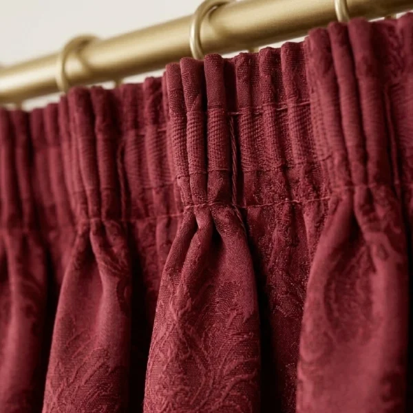 Burgundy pencil pleat jacquard curtain heading close up