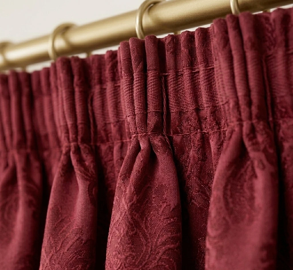 Burgundy pencil pleat jacquard curtain heading close up
