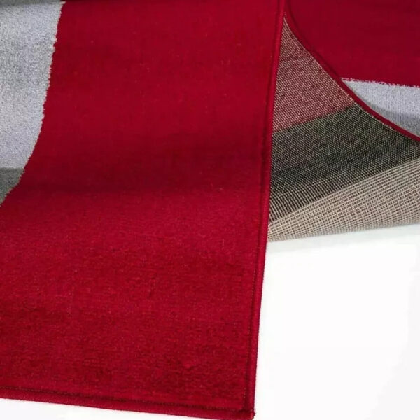 Folded corner of Black Red Kilas Geometric Rug showing pile and backing Rugstars UK