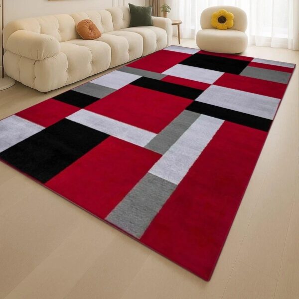 Black Red Kilas Modern Geometric Rug with red, black, grey and white blocks in a living room Rugstars UK