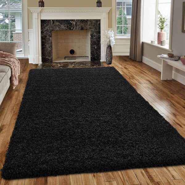 Black Verona Thick Shaggy Rug in a living room Rugstars UK