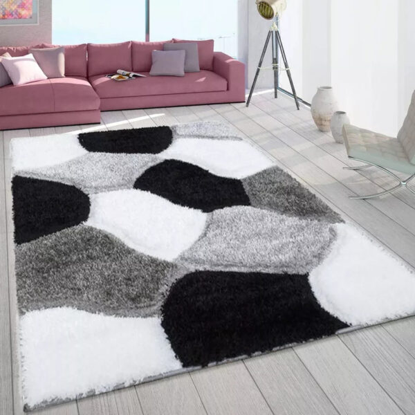 Black White Pona Pebble Shaggy Rug in black, grey and white in a room setting Rugstars UK