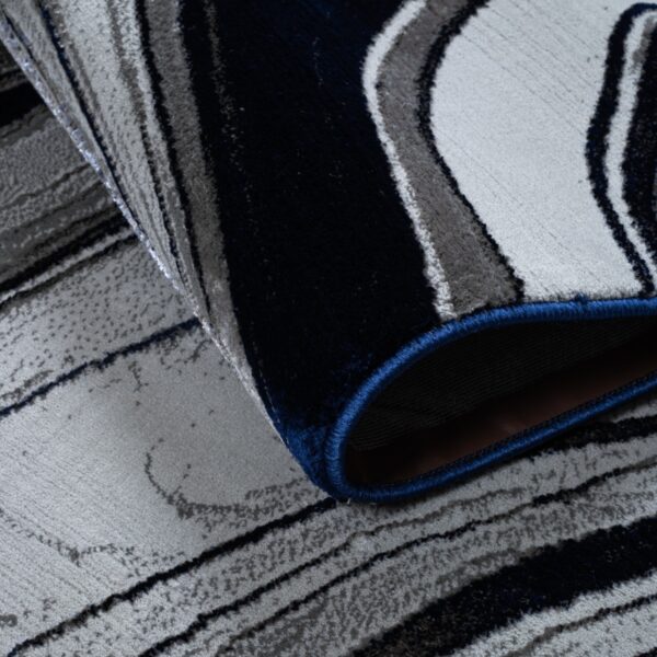 Blue Gant Marble Effect Rug folded corner showing the backing Rugstars UK