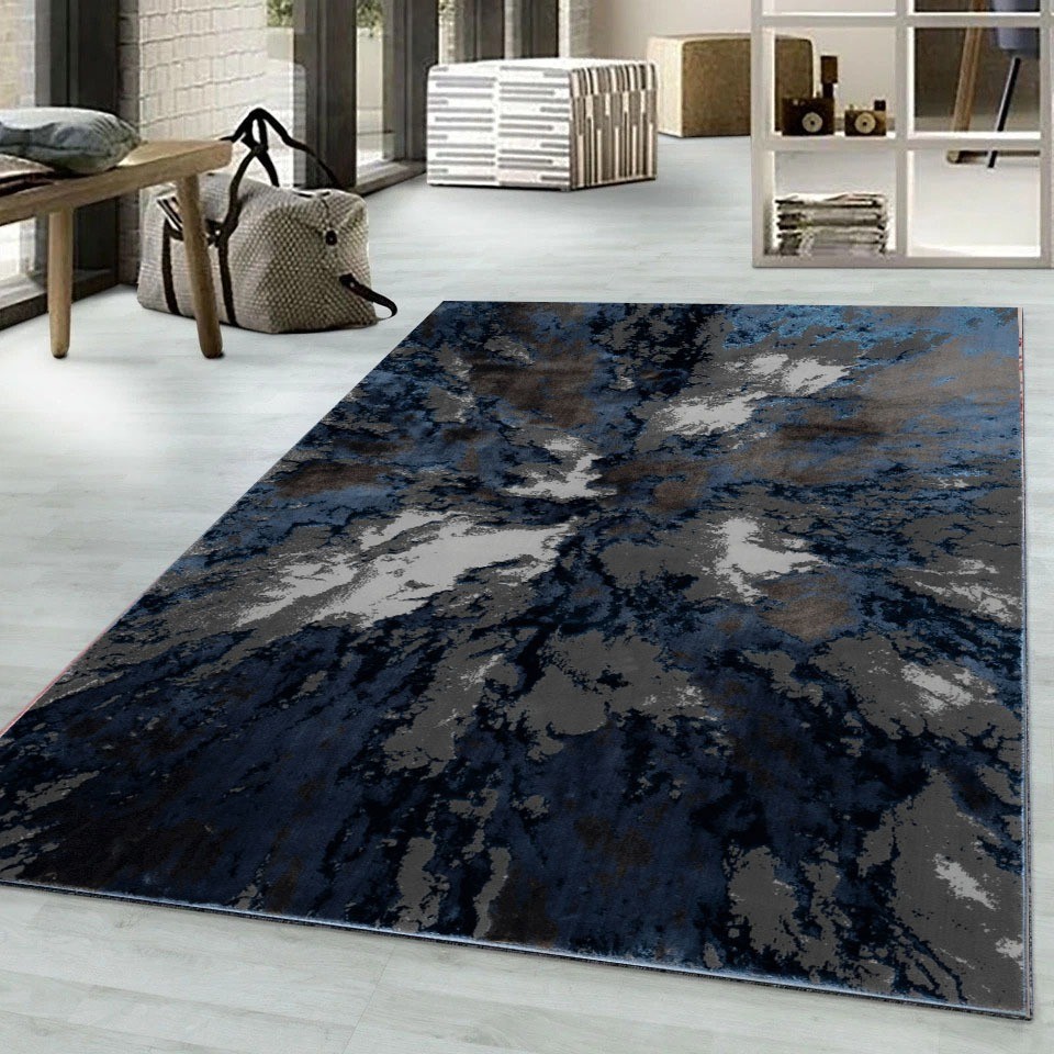 Blue Harlo Abstract Area Rug in dark blue and charcoal in a living room Rugstars UK
