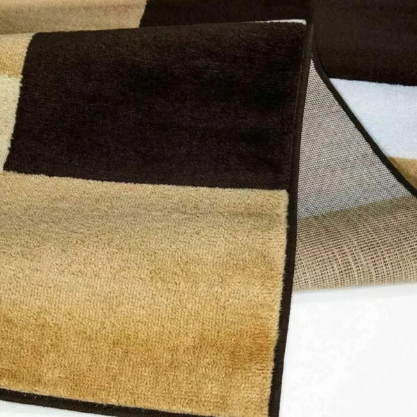 Folded corner of Brown Beige Kilas Geometric Rug showing pile and backing Rugstars UK
