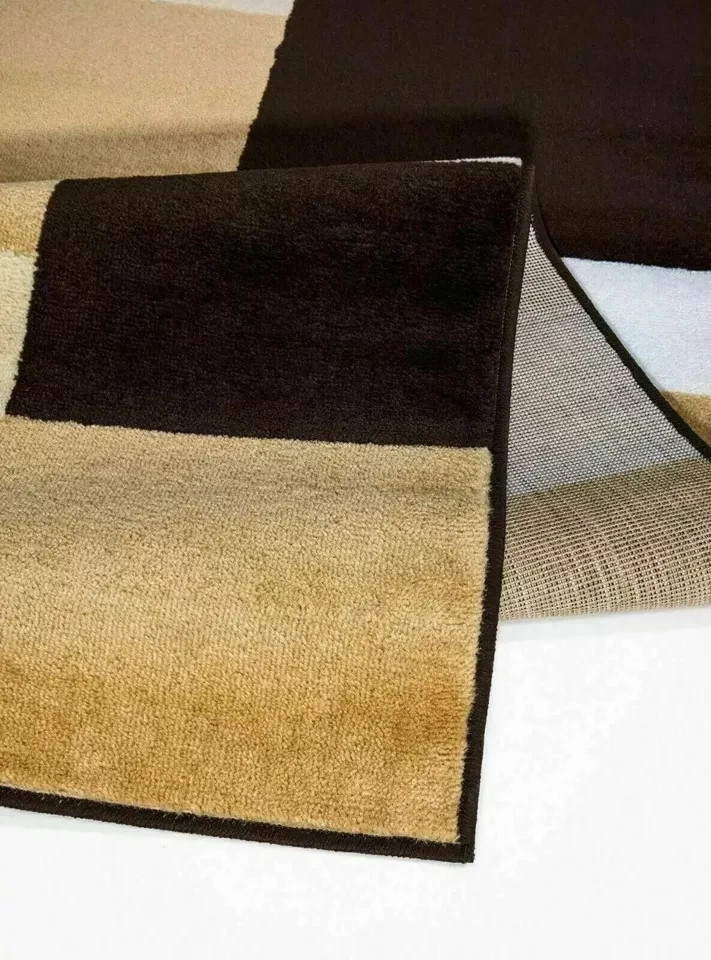 Folded corner of Brown Beige Kilas Geometric Rug showing pile and backing Rugstars UK