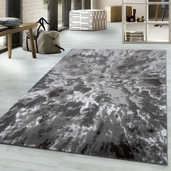 Grey Harlo Abstract Area Rug in grey and silver in a living room Rugstars UK