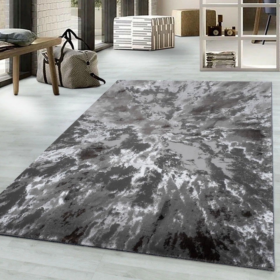 Grey Harlo Abstract Area Rug in grey and silver in a living room Rugstars UK