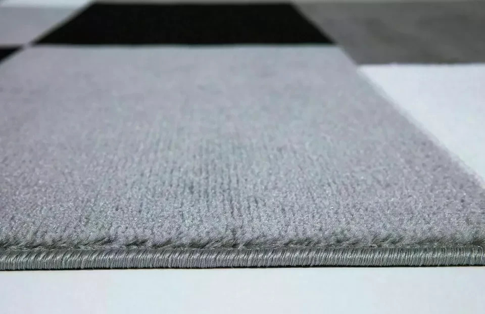 Close up of Grey Kilas Geometric Rug carved pile Rugstars UK