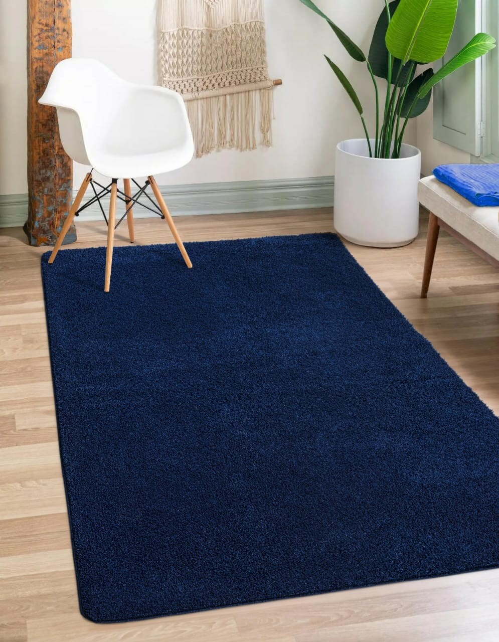 Navy Verona Thick Shaggy Rug in navy blue in a living room Rugstars UK