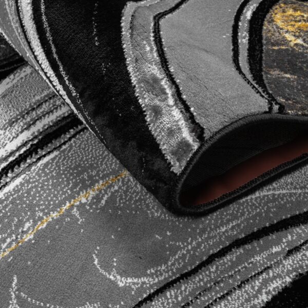 Ochre Gant Marble Effect Rug folded corner showing the backing Rugstars UK