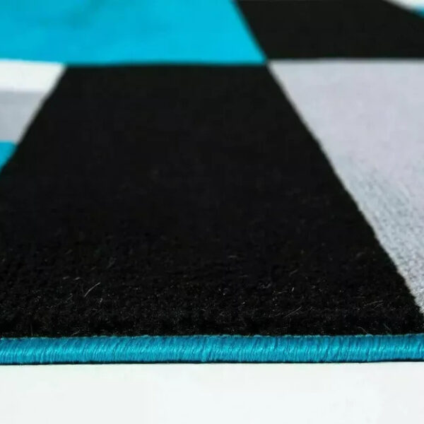 Close up of Teal Black Kilas Geometric Rug carved pile Rugstars UK