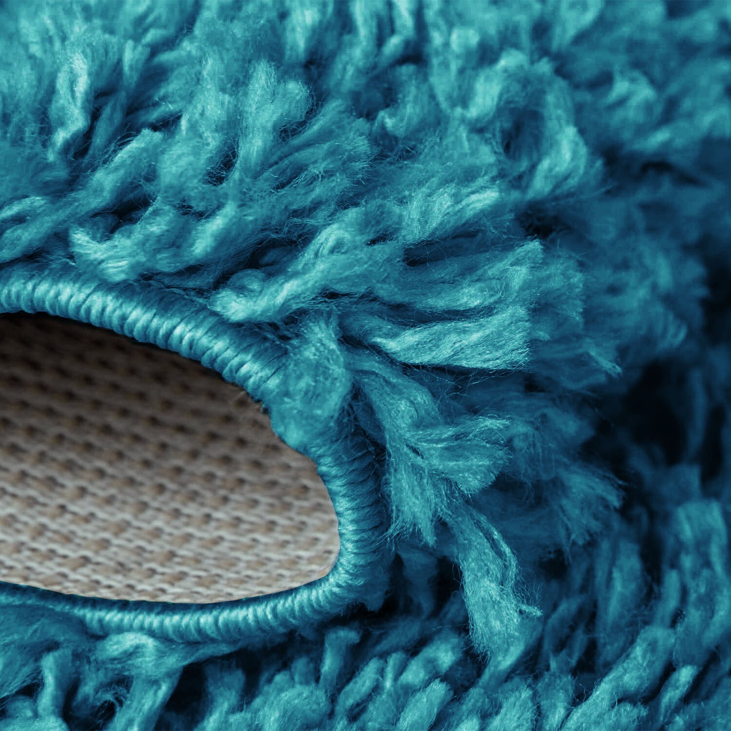 Teal Verona Thick Shaggy Rug folded corner showing the backing Rugstars UK